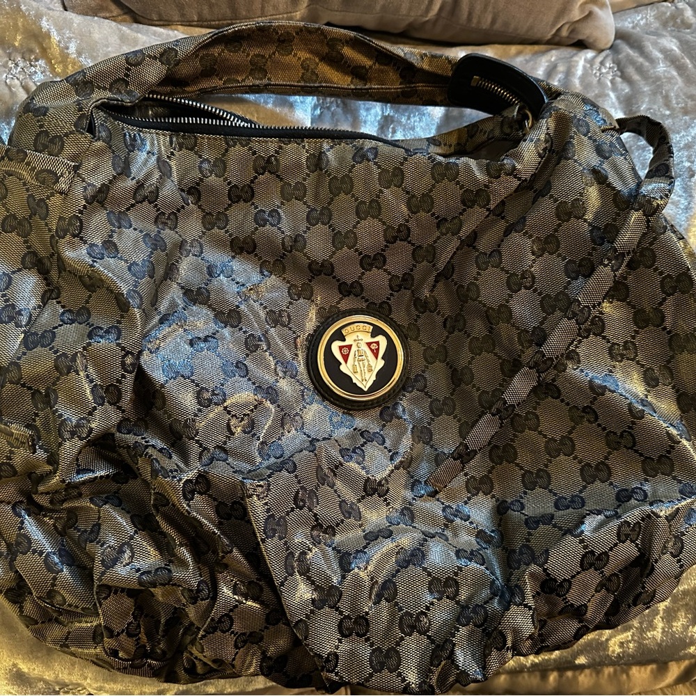 Gucci Black and Gold Monogrammed Fabric